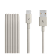Pleciony przewód Beats USB‑A do USB‑C (1,5 m) — Błyskawiczny beż